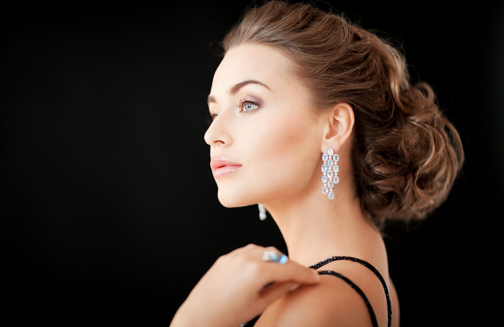 woman with diamond earrings