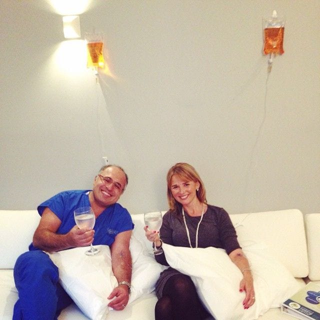 Dr. Kevin Tehrani and a patient receiving a vitamin immune drip