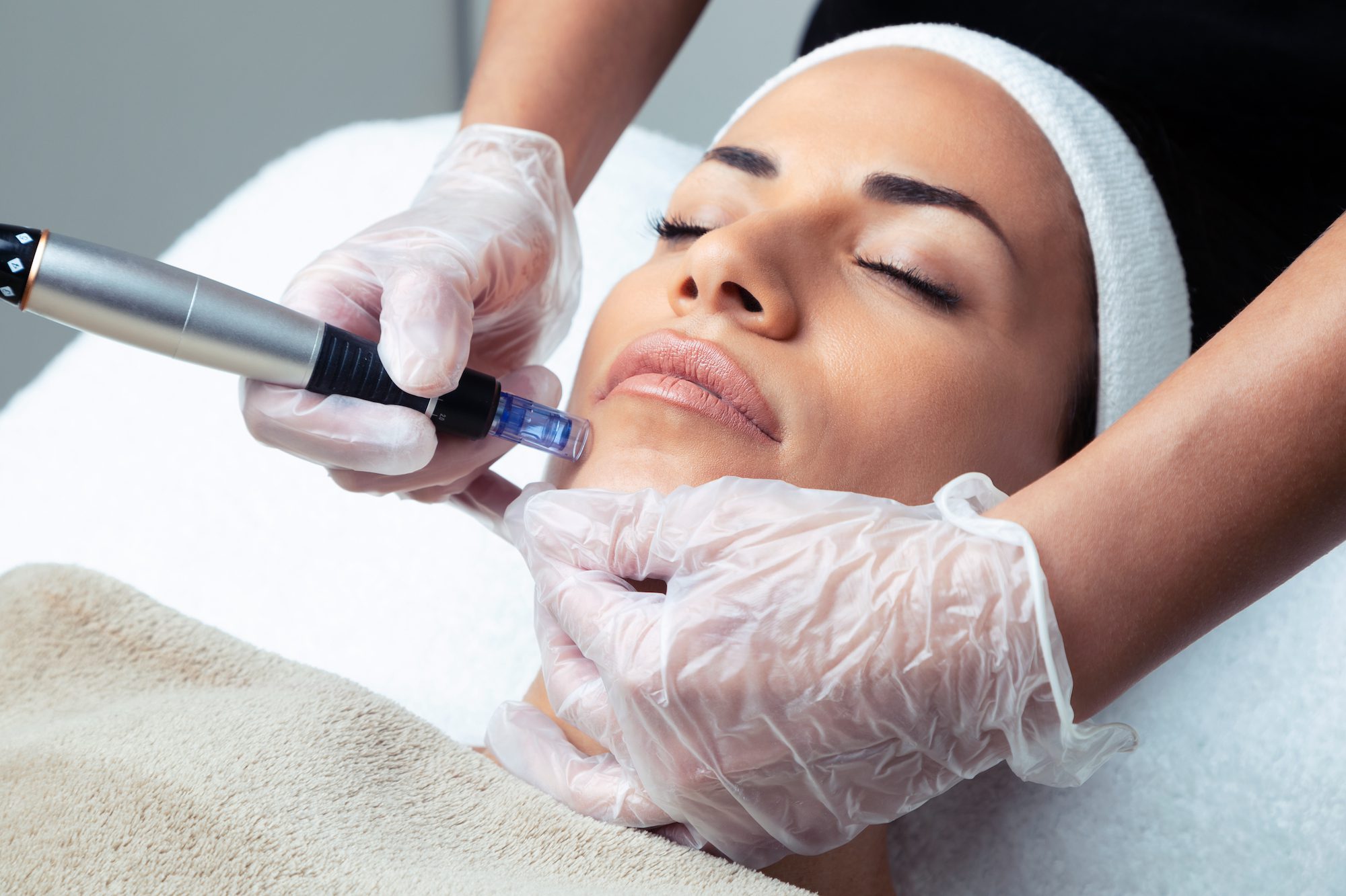 woman receiving facial treatment